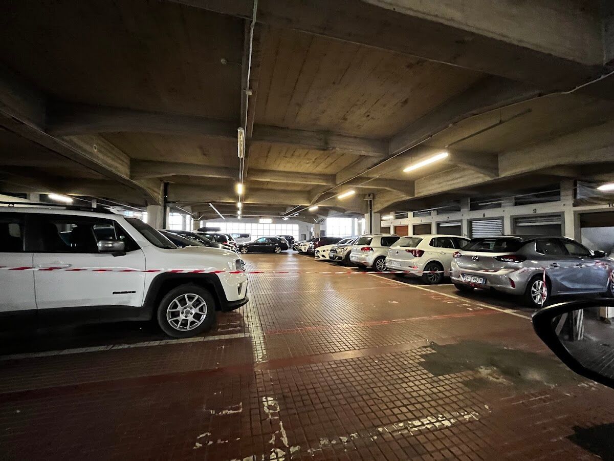 Interparking Garage Europa: covered garage level with parked cars and numbered bays